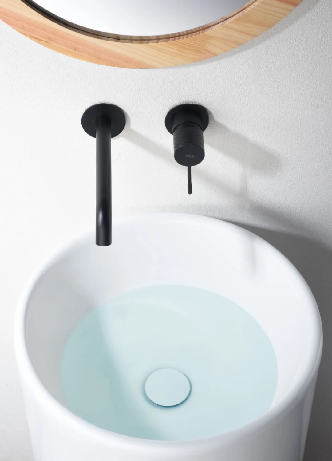 Black tapware and white sink