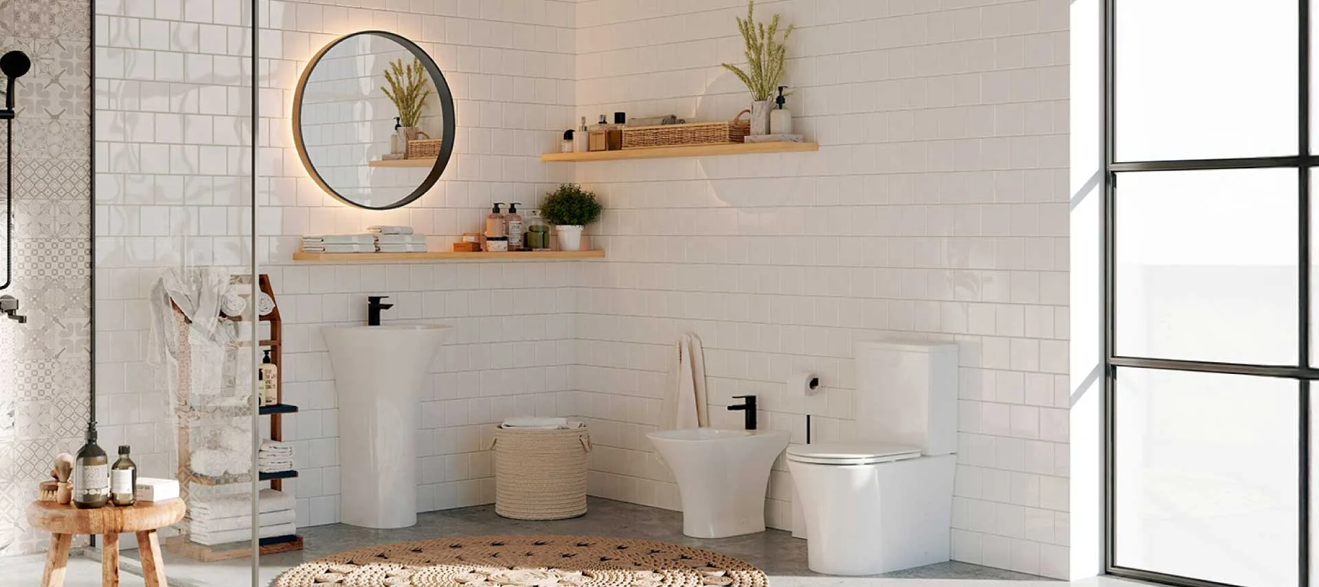 White wash hand basin in a bathroom with a wall mirror and a white toilet.