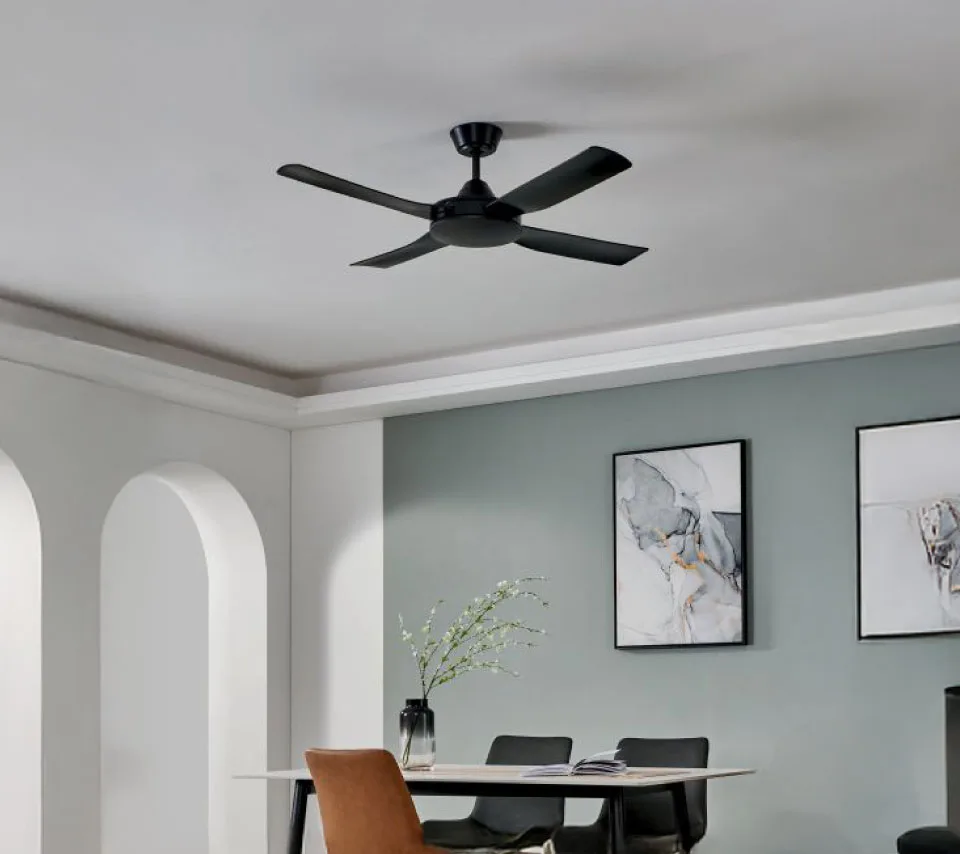 Modern black ceiling fan brings sleek style and perfect airflow above the dining table.